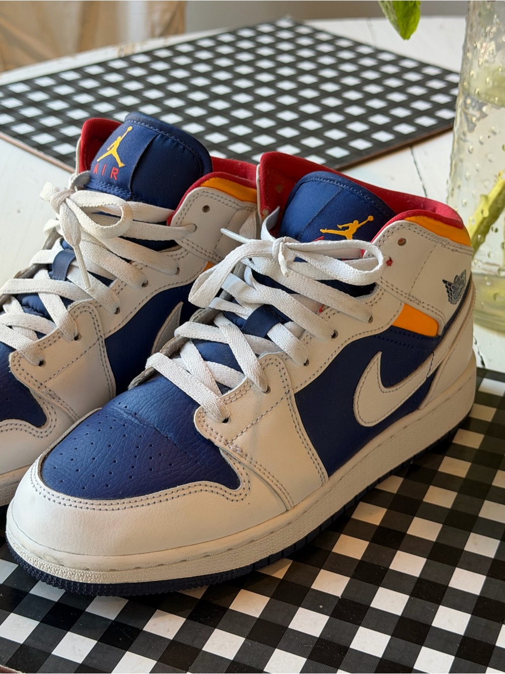 Jordan 1 Mid Top Sneakers in Navy, White & Red